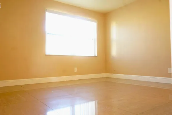 an empty room with a window
