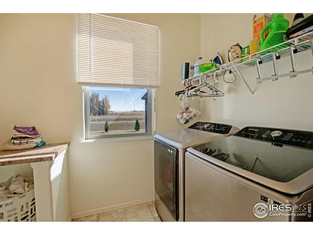 a kitchen with a stove and a refrigerator