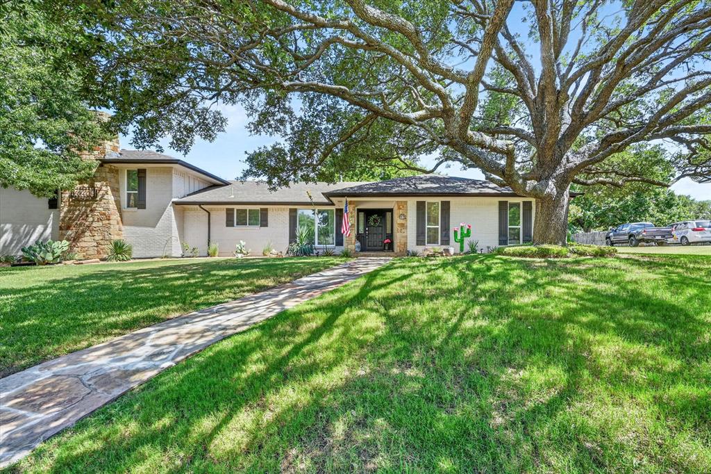 47 Bounty Road East Benbrook, TX 76132 - Photo 38 of 39 Traditional-style residence with a prominent mature tree providing ample shade