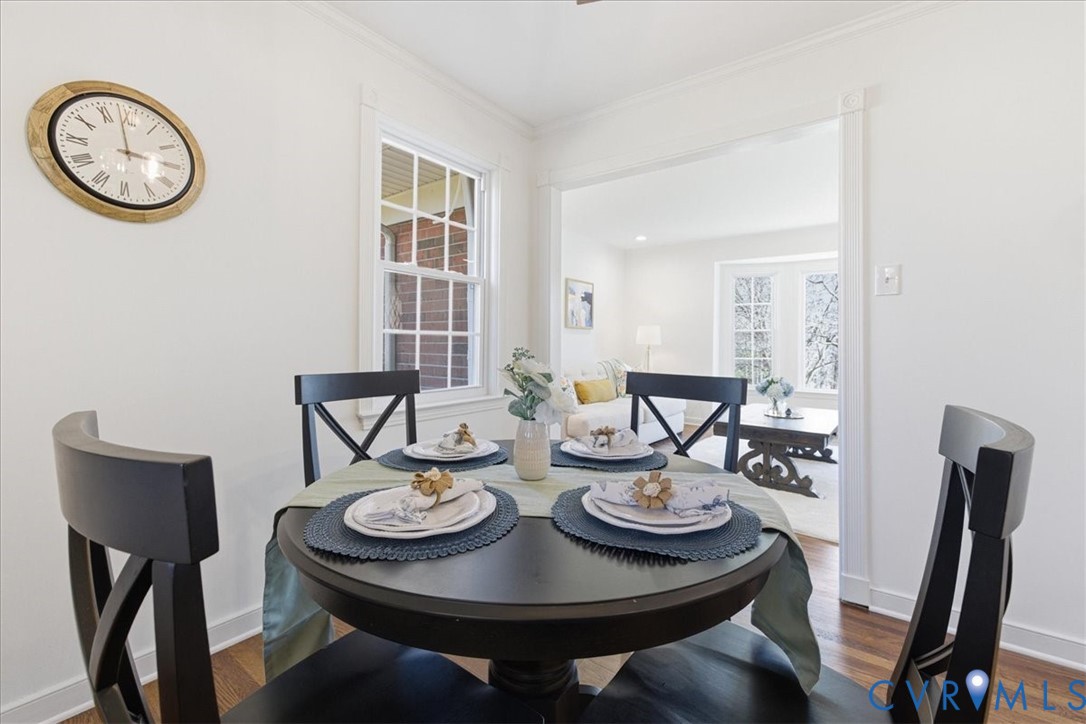 11719 Heathmere Crescent Midlothian, VA 23113 - Photo 12 of 31 a view of a dining room with furniture and window