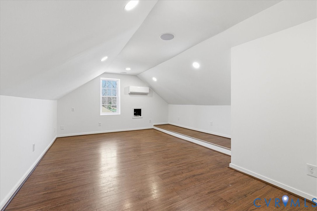 11719 Heathmere Crescent Midlothian, VA 23113 - Photo 21 of 31 a view of an empty room with wooden floor