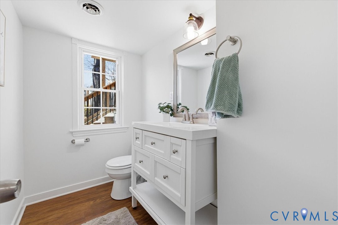 11719 Heathmere Crescent Midlothian, VA 23113 - Photo 23 of 31 a bathroom with a toilet sink and mirror