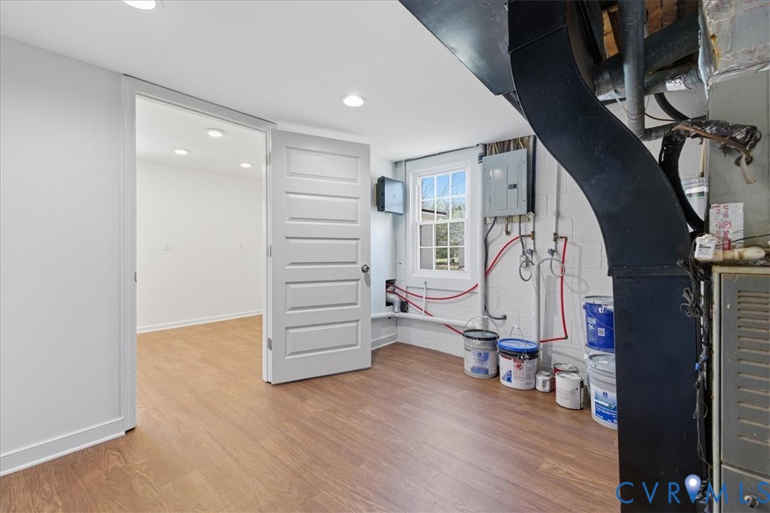 11719 Heathmere Crescent Midlothian, VA 23113 - Photo 24 of 31 a view of entryway with wooden floor and stairs