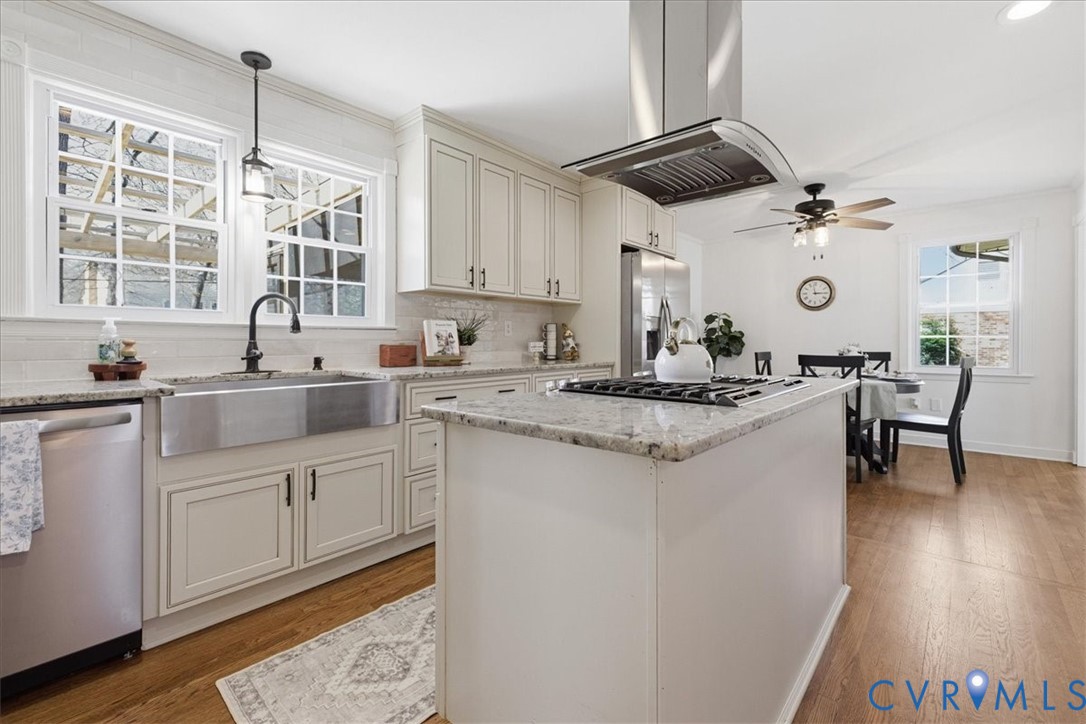 11719 Heathmere Crescent Midlothian, VA 23113 - Photo 10 of 31 a kitchen with a sink cabinets and window