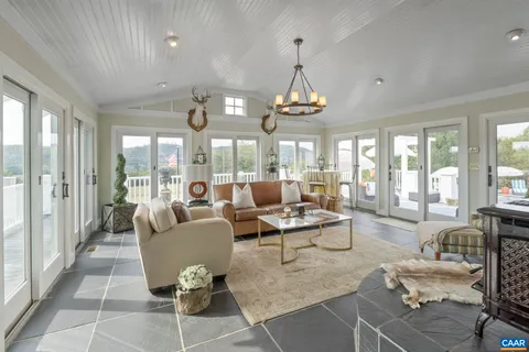 a view of a balcony with wooden floor