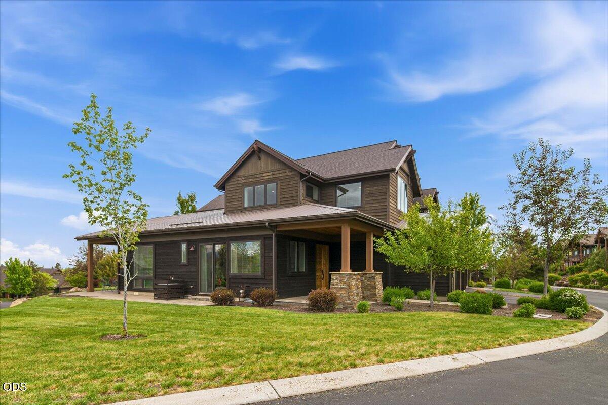 61333 Kindle Rock Loop Bend, OR 97702 - Photo 2 of 53 a view of a house with a yard porch and sitting area