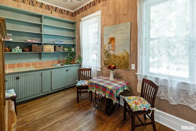a living room with fireplace furniture and a flat screen tv