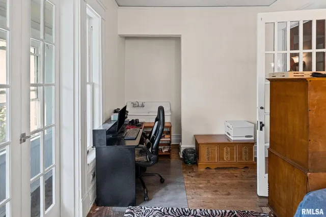 a bathroom with a sink and a window