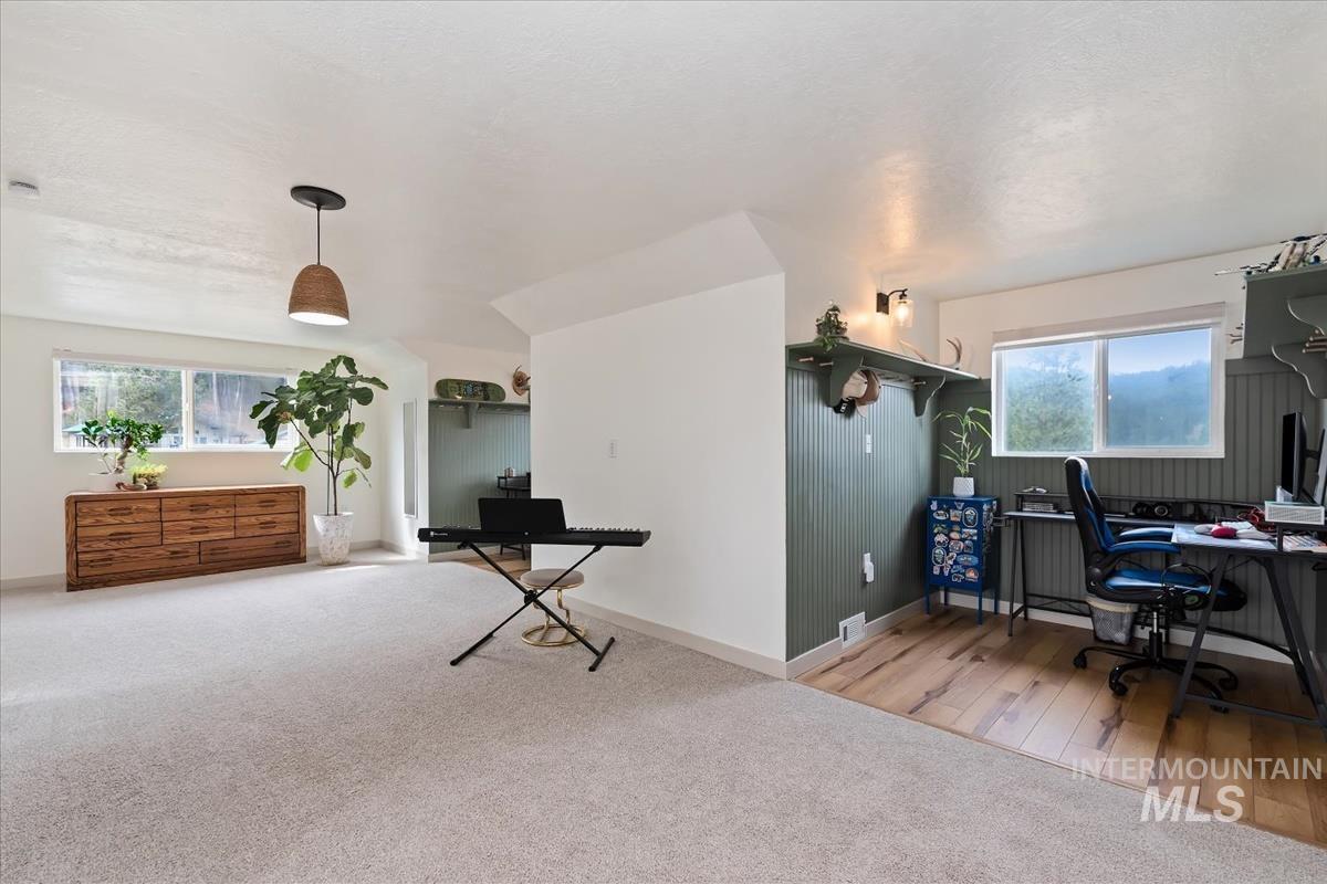 6 East Beck Road Garden Valley, ID 83622 - Photo 16 of 44 Office space featuring light colored carpet and light wood finished floors