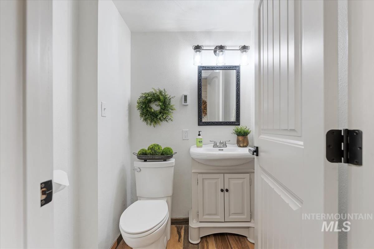 6 East Beck Road Garden Valley, ID 83622 - Photo 24 of 44 Bathroom with vanity and wood finished floors