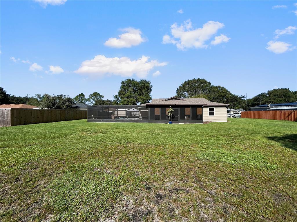 136 Paul Revere Road Bartow, FL 33830 - Photo 2 of 17 a front view of a house with garden