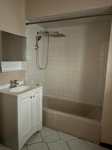 a bathroom with a sink and a bathtub