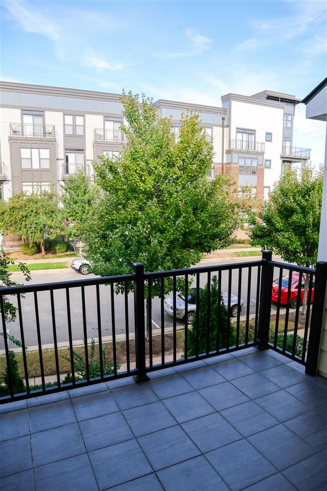 9156 Wooden Road Raleigh, NC 27617 - Photo 8 of 25 Balcony off of main level living areas