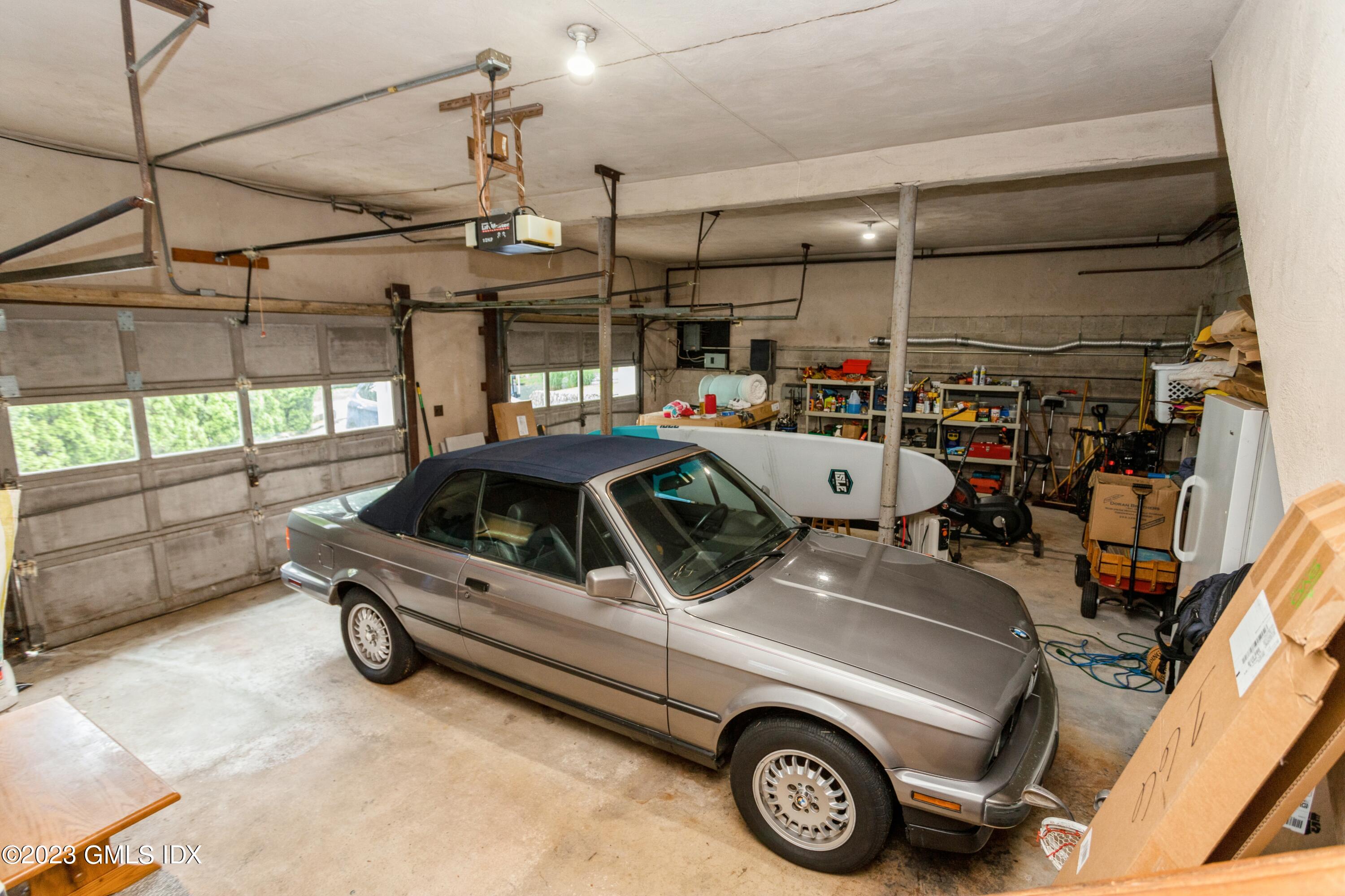 29 Dandy Drive Cos Cob, CT 06807 - Photo 13 of 17 a view of parking garage with cars