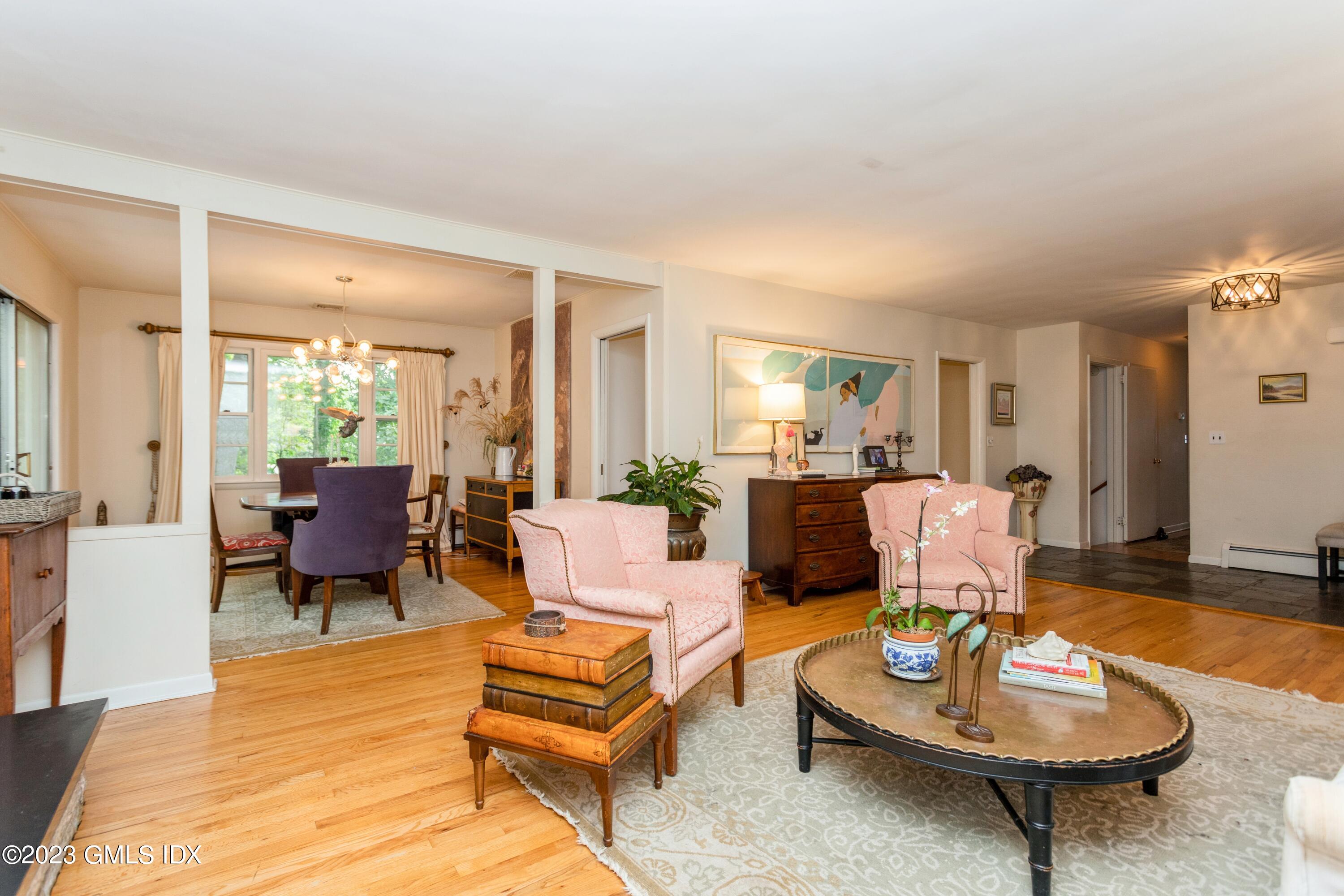 29 Dandy Drive Cos Cob, CT 06807 - Photo 3 of 17 a living room with furniture and a wooden floor