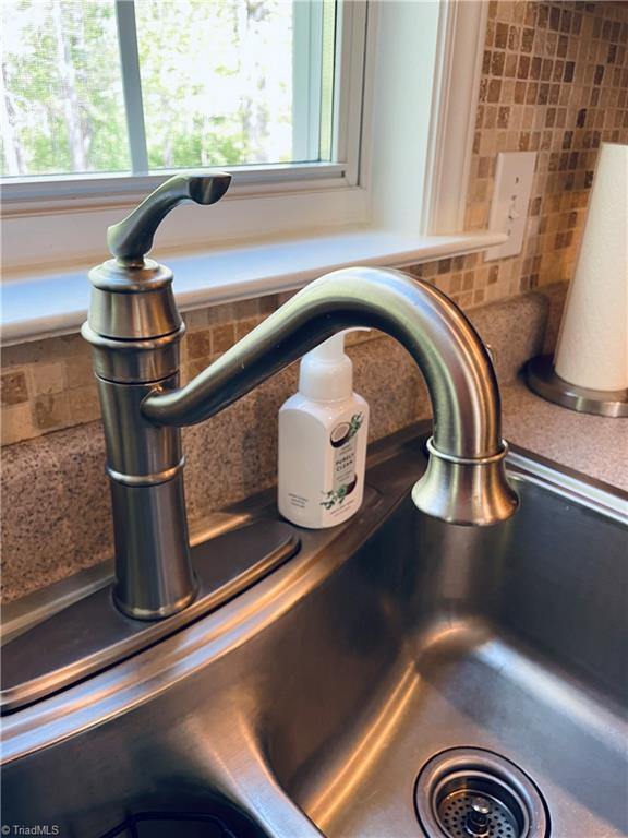 7818 Wilson Farm Road Summerfield, NC 27358 - Photo 13 of 50 Updated kitchen faucet