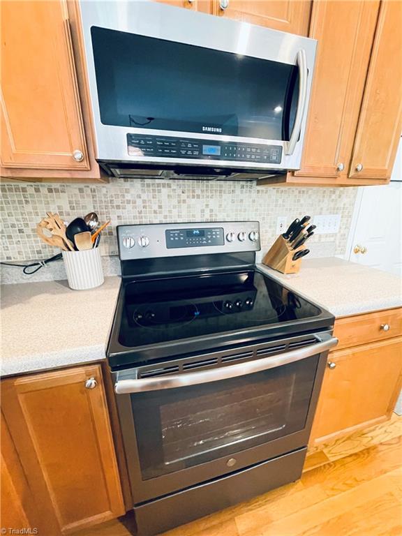 7818 Wilson Farm Road Summerfield, NC 27358 - Photo 18 of 50 Tile kitchen backsplash