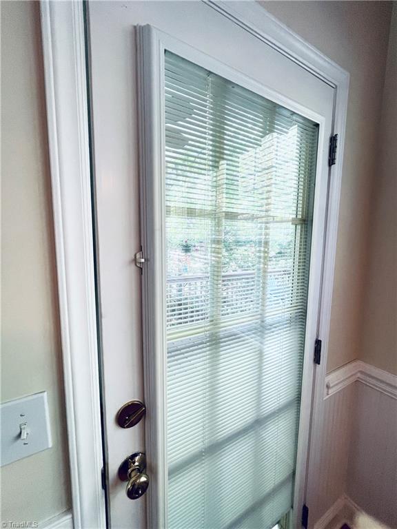 7818 Wilson Farm Road Summerfield, NC 27358 - Photo 19 of 50 Blinds behind glass door