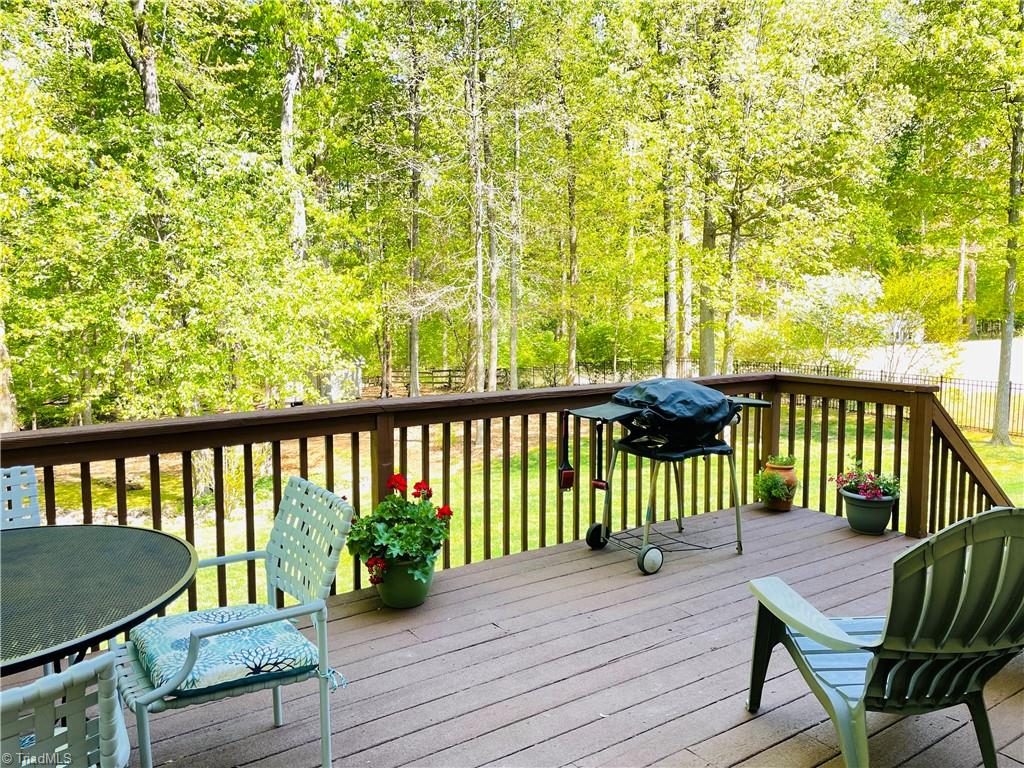 7818 Wilson Farm Road Summerfield, NC 27358 - Photo 25 of 50 Partially wooded backyard, great space for entertaining