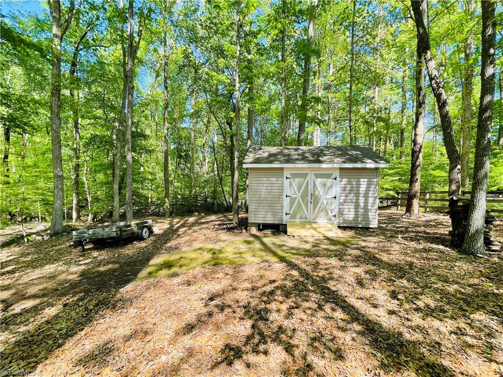 7818 Wilson Farm Road Summerfield, NC 27358 - Photo 32 of 50 12x16 storage building