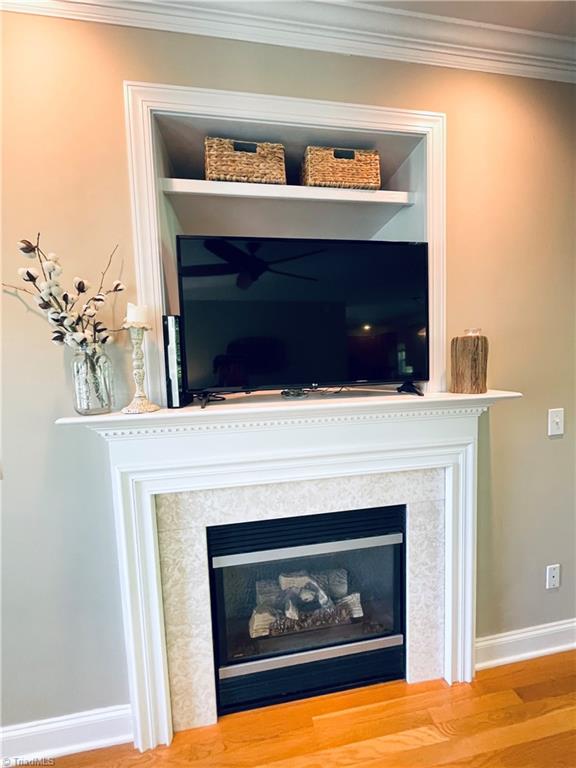 7818 Wilson Farm Road Summerfield, NC 27358 - Photo 36 of 50 Fireplace in LR with gas logs