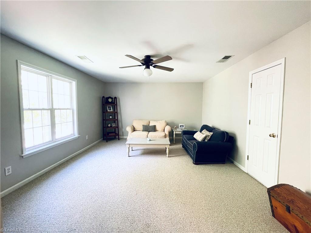 7818 Wilson Farm Road Summerfield, NC 27358 - Photo 43 of 50 Bonus room - attic storage space to the right. Also has closet