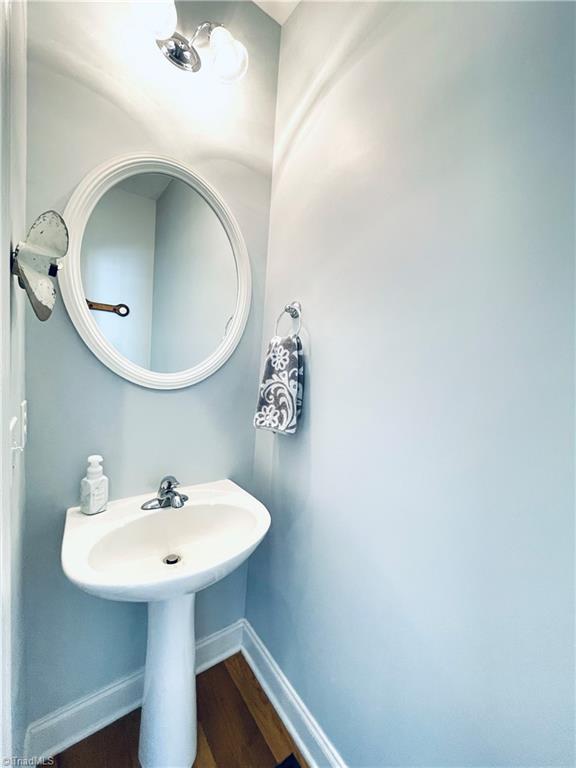7818 Wilson Farm Road Summerfield, NC 27358 - Photo 47 of 50 Hall half bath on main