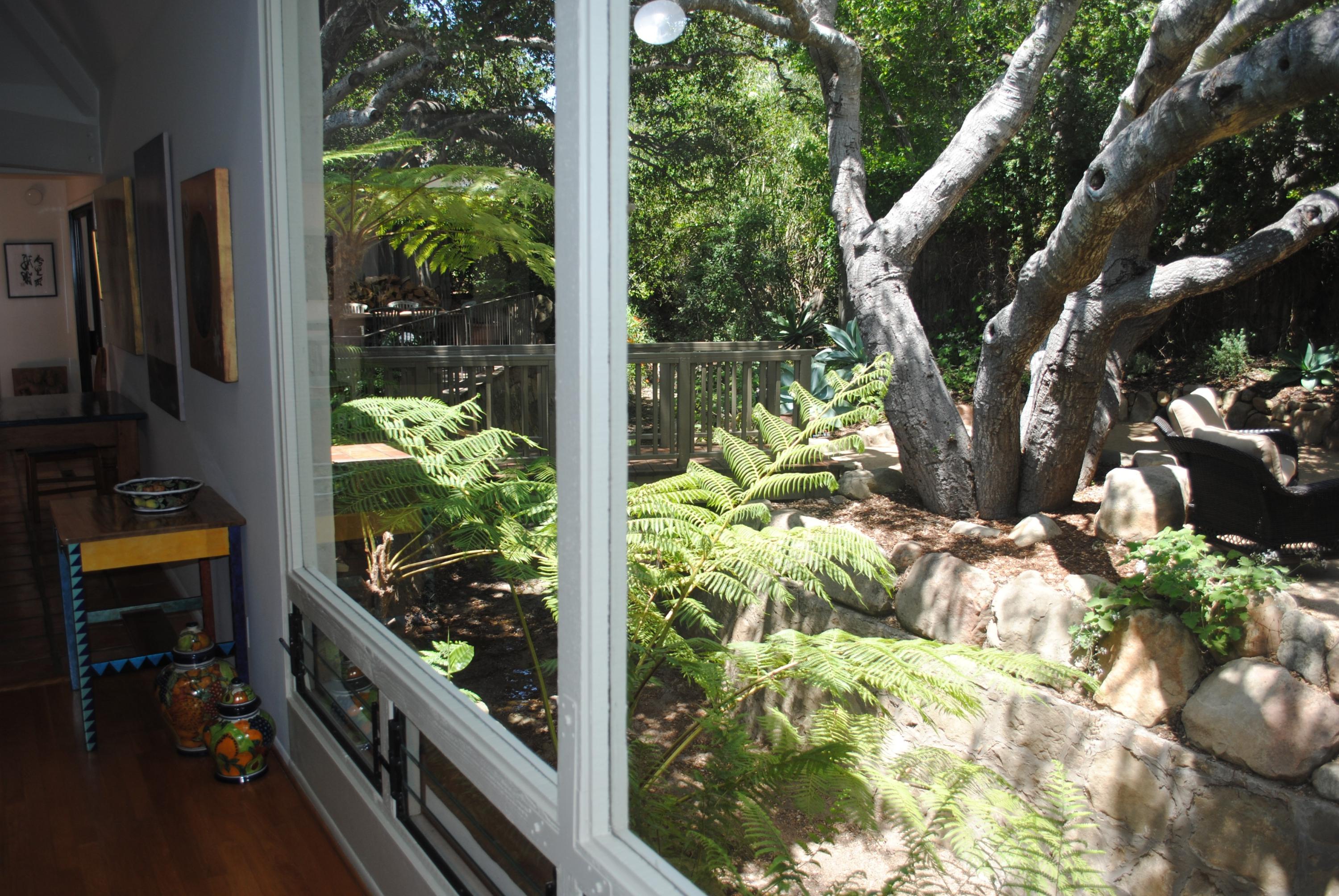548 San Ysidro Road, Unit A Santa Barbara, CA 93108 - Photo 6 of 25 Garden View thru Picture Window