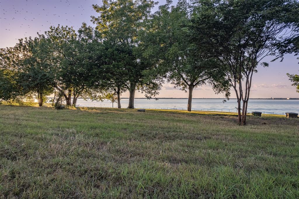 520 Terry Lane Heath, TX 75032 - Photo 18 of 28 a view of outdoor space with garden and trees