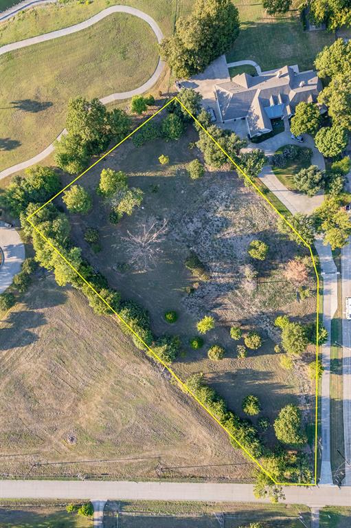 520 Terry Lane Heath, TX 75032 - Photo 7 of 28 an aerial view of a house a yard basket ball court and outdoor seating