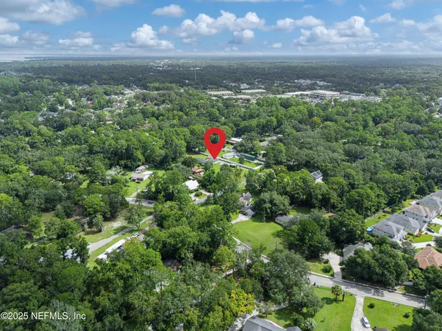 a bathroom with a sink toilet and mirror
