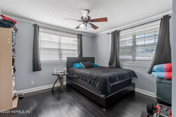 a view of a dining area with furniture window and wooden floor