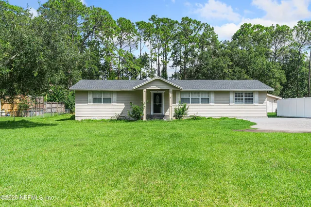 a view of a garden with houses