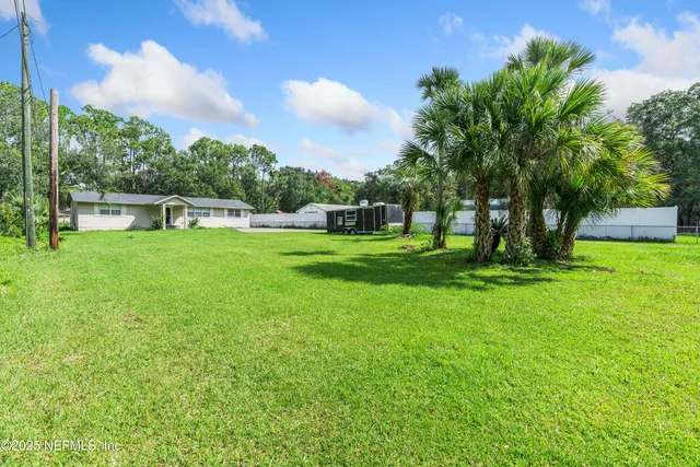 a view of an outdoor space and a yard