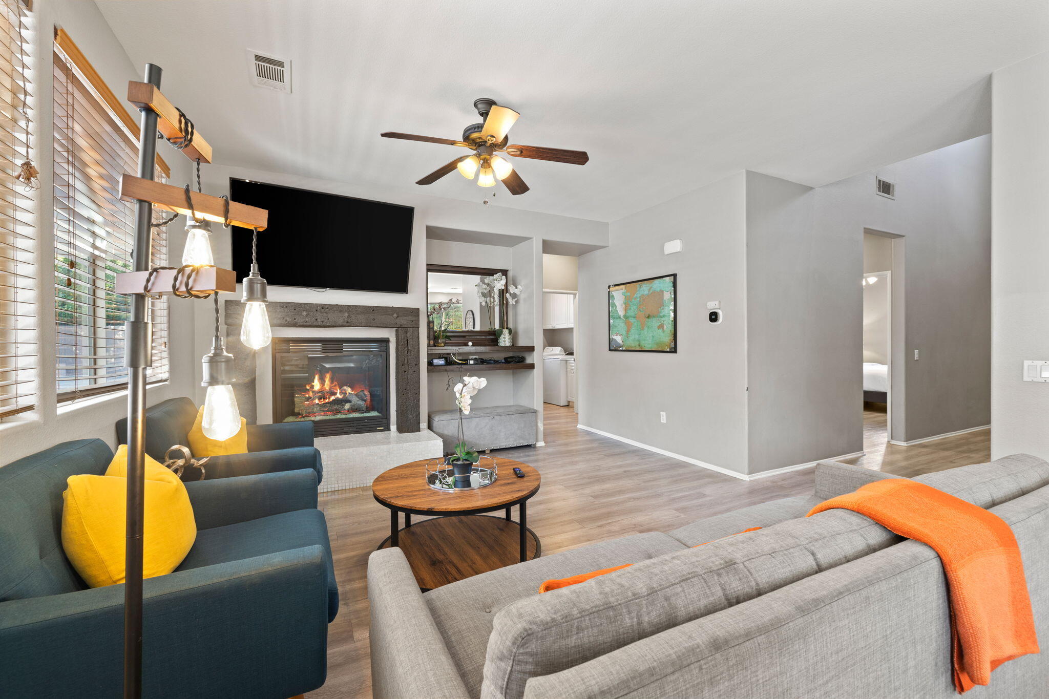 80759 Avery Drive Indio, CA 92201 - Photo 18 of 70 a living room with furniture a fireplace and a flat screen tv