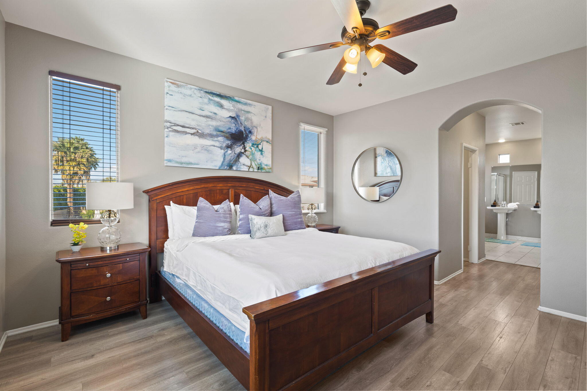 80759 Avery Drive Indio, CA 92201 - Photo 24 of 70 a bedroom with a bed and a chandelier