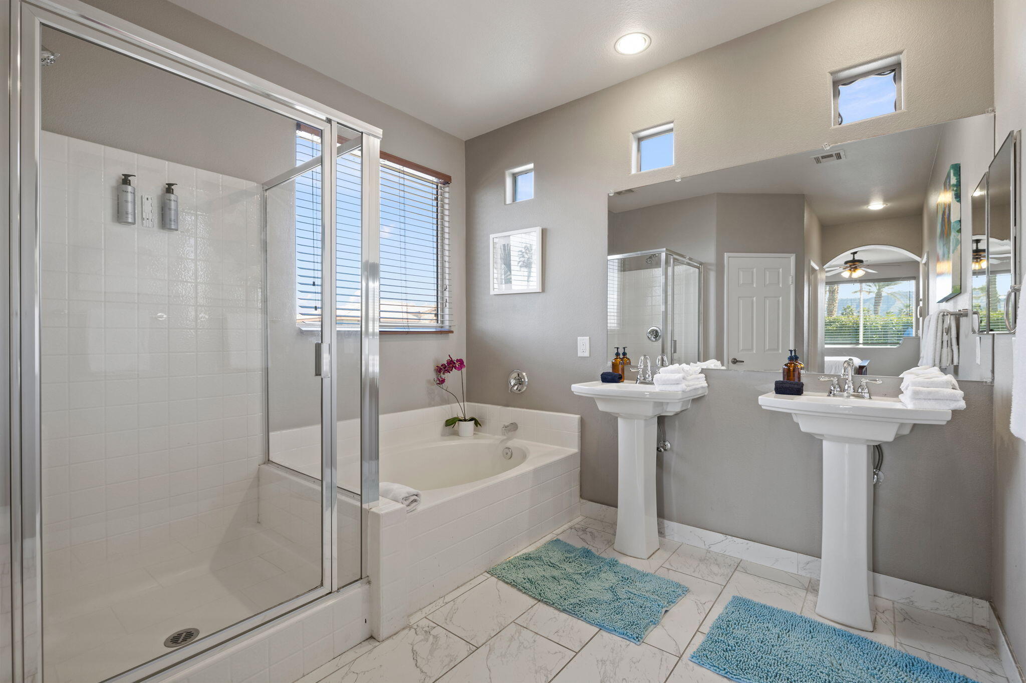 80759 Avery Drive Indio, CA 92201 - Photo 25 of 70 a bathroom with a sink a mirror toilet and bathtub