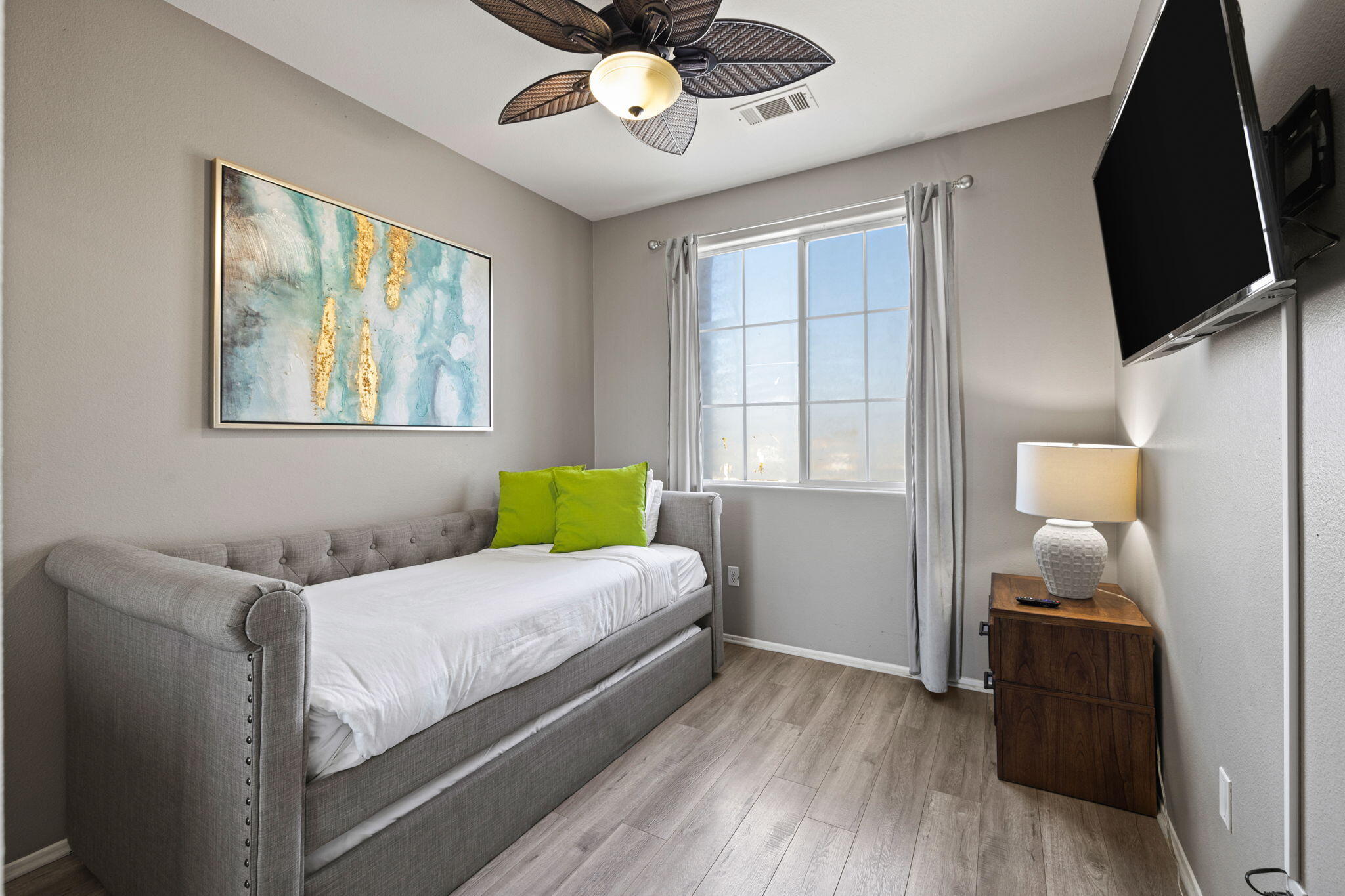 80759 Avery Drive Indio, CA 92201 - Photo 32 of 70 a bedroom with a bed and wooden floor