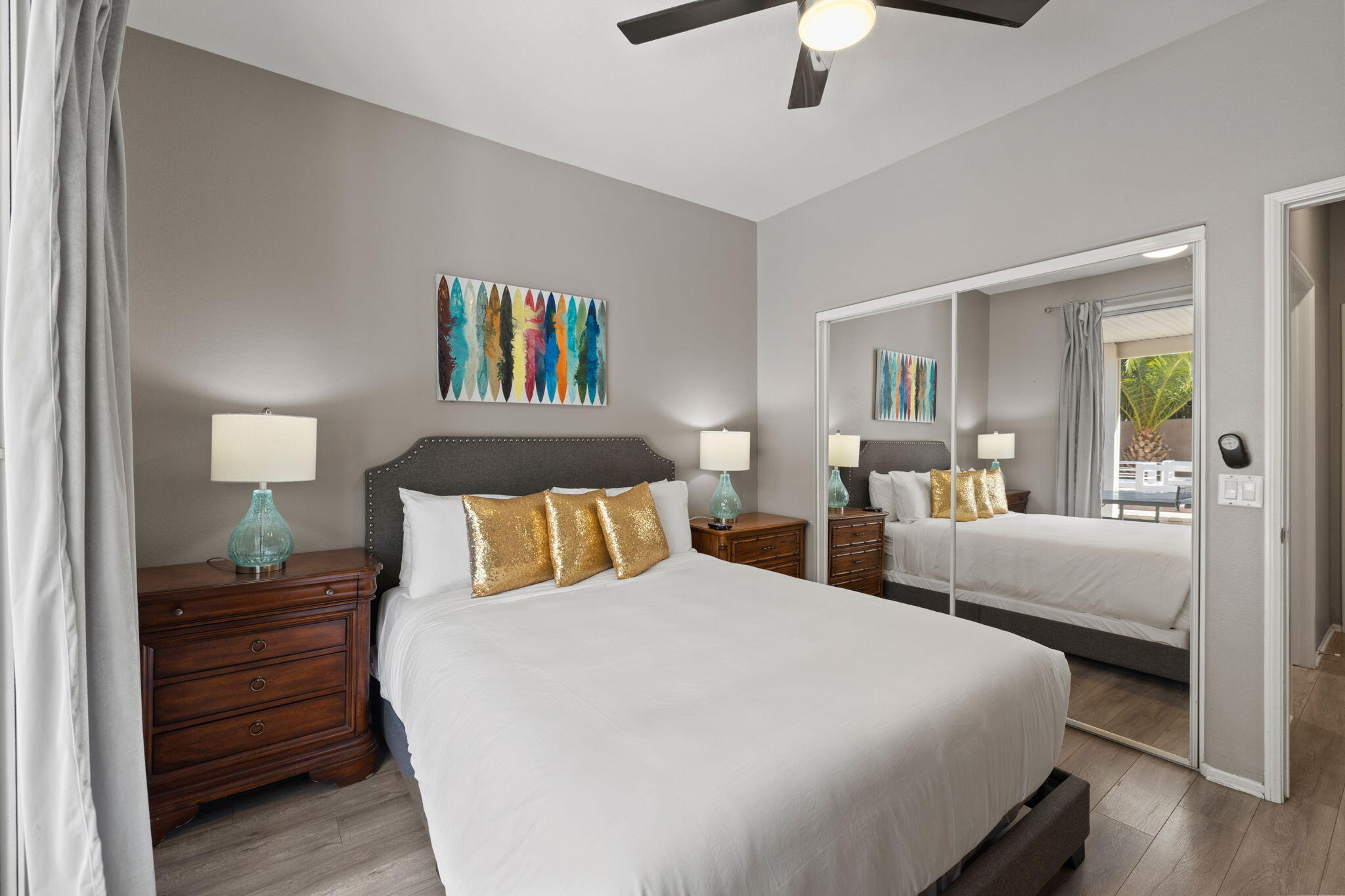 80759 Avery Drive Indio, CA 92201 - Photo 38 of 70 a bed room with a bed and a chandelier