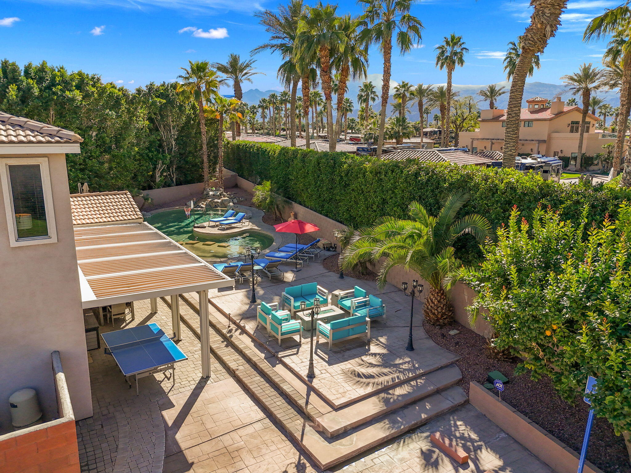 80759 Avery Drive Indio, CA 92201 - Photo 4 of 70 a view of a backyard with sitting area