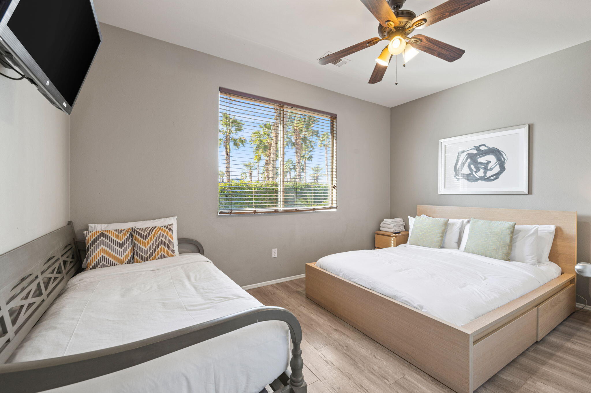 80759 Avery Drive Indio, CA 92201 - Photo 41 of 70 a bedroom with a large bed and a chandelier