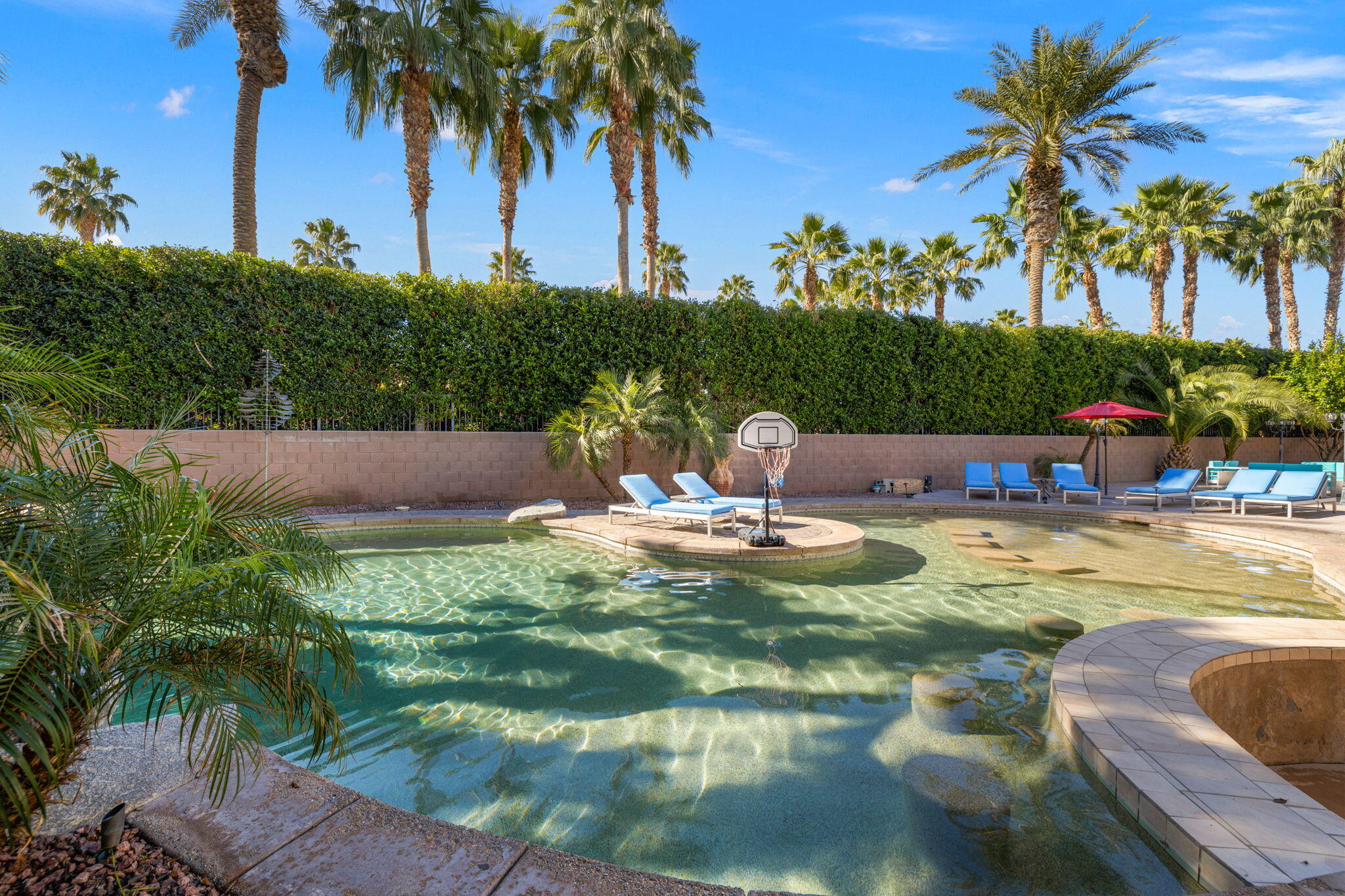 80759 Avery Drive Indio, CA 92201 - Photo 48 of 70 a view of swimming pool with a table and chairs