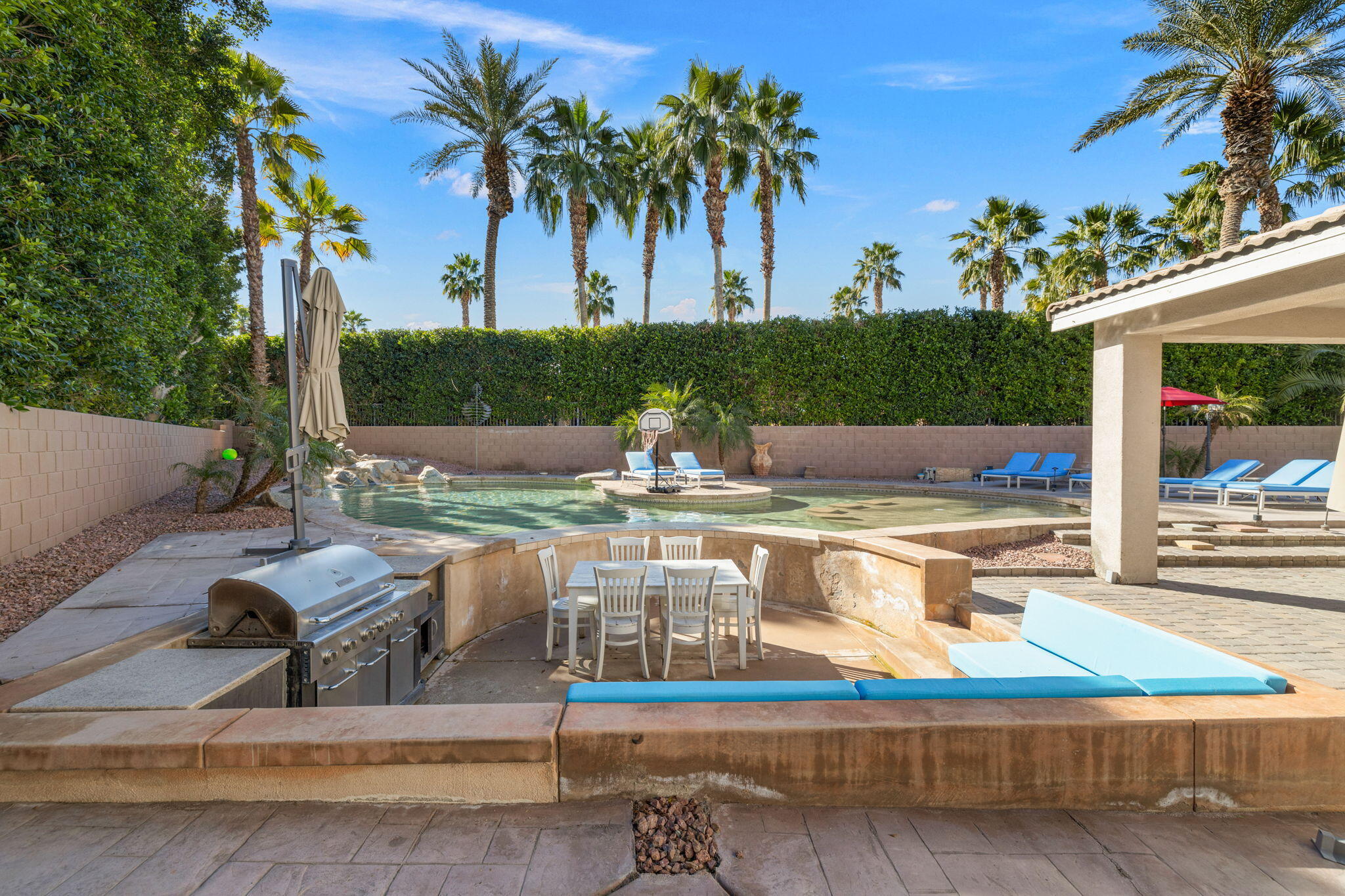 80759 Avery Drive Indio, CA 92201 - Photo 53 of 70 a view of swimming pool with table and chairs potted plants