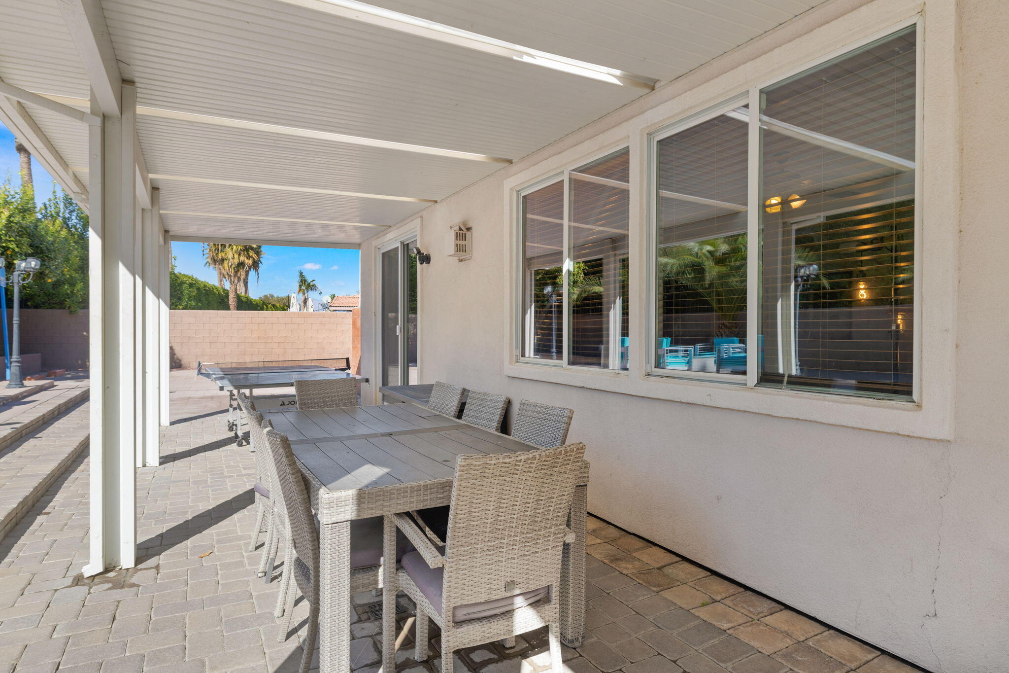 80759 Avery Drive Indio, CA 92201 - Photo 63 of 70 a view of an outdoor dining space with a table and chairs