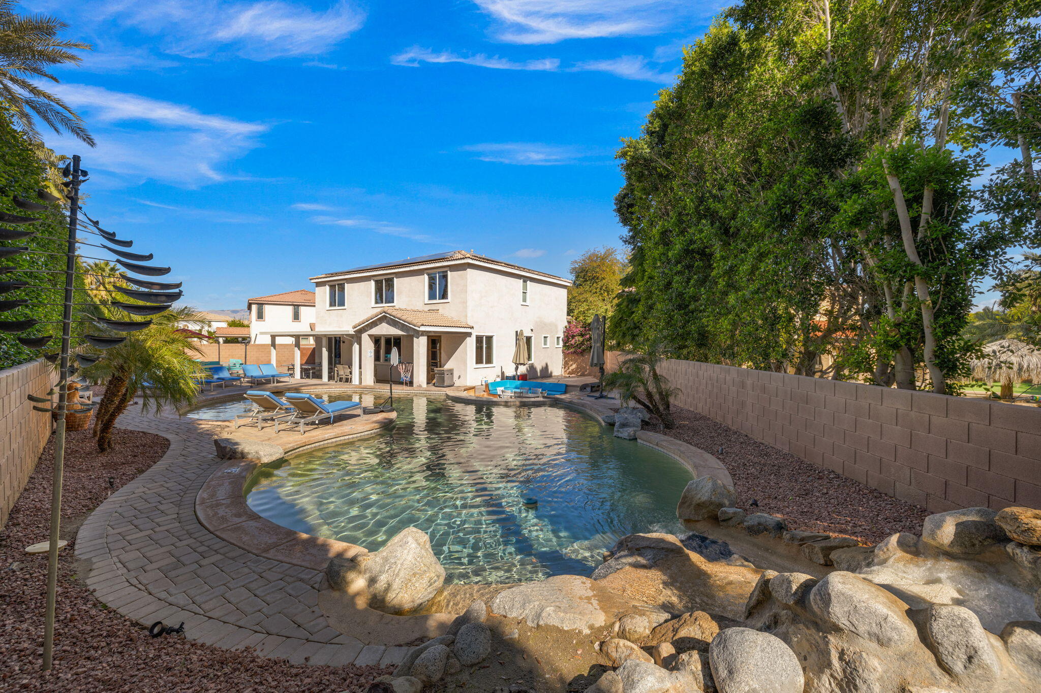 80759 Avery Drive Indio, CA 92201 - Photo 69 of 70 a view of a swimming pool with sitting area