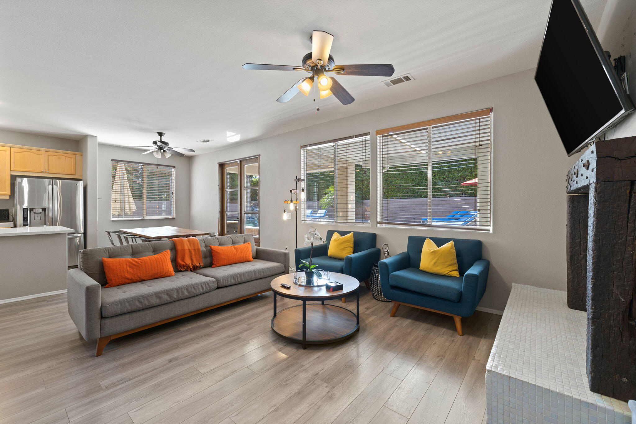 80759 Avery Drive Indio, CA 92201 - Photo 9 of 70 a living room with furniture a fireplace and a flat screen tv
