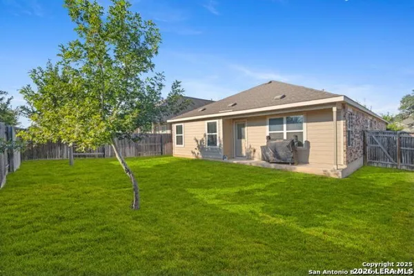 a view of a yard in front of house