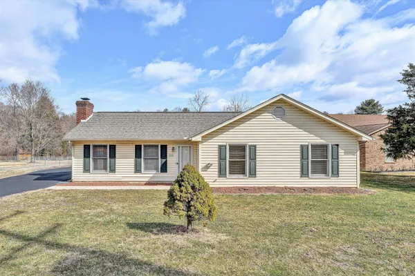 front view of house with a yard