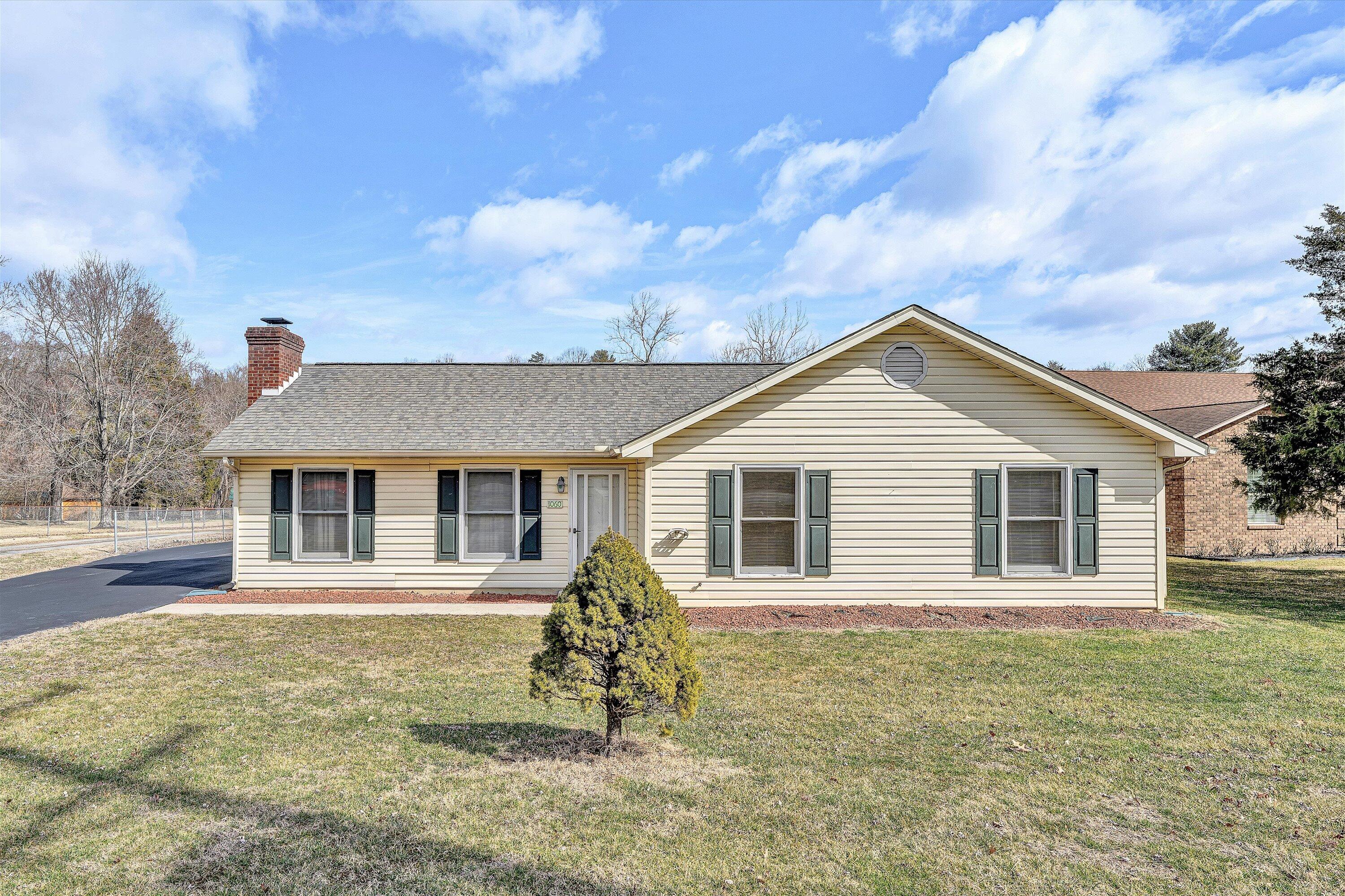 front view of house with a yard