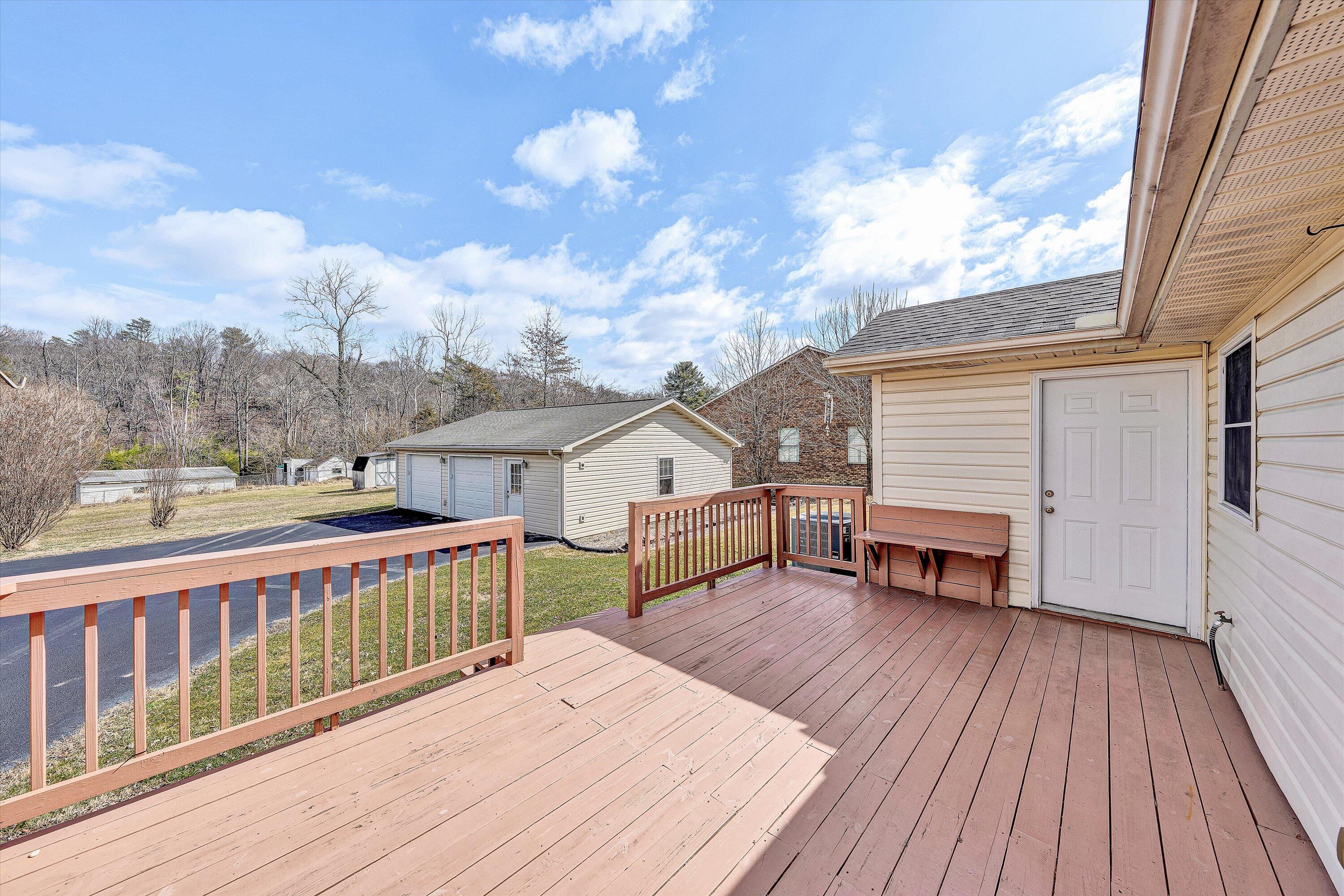 1060 Kessler Mill Road Salem, VA 24153 - Photo 17 of 31 a view of a house with wooden deck